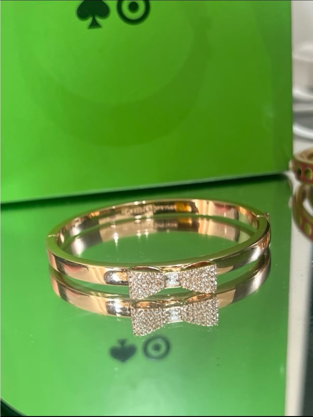 Kate Spade New York Ready Set Bow Bangle Hinged Bracelet. Rose Gold tone